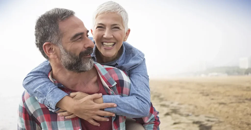 Happy Senior Couple With Dental Implants