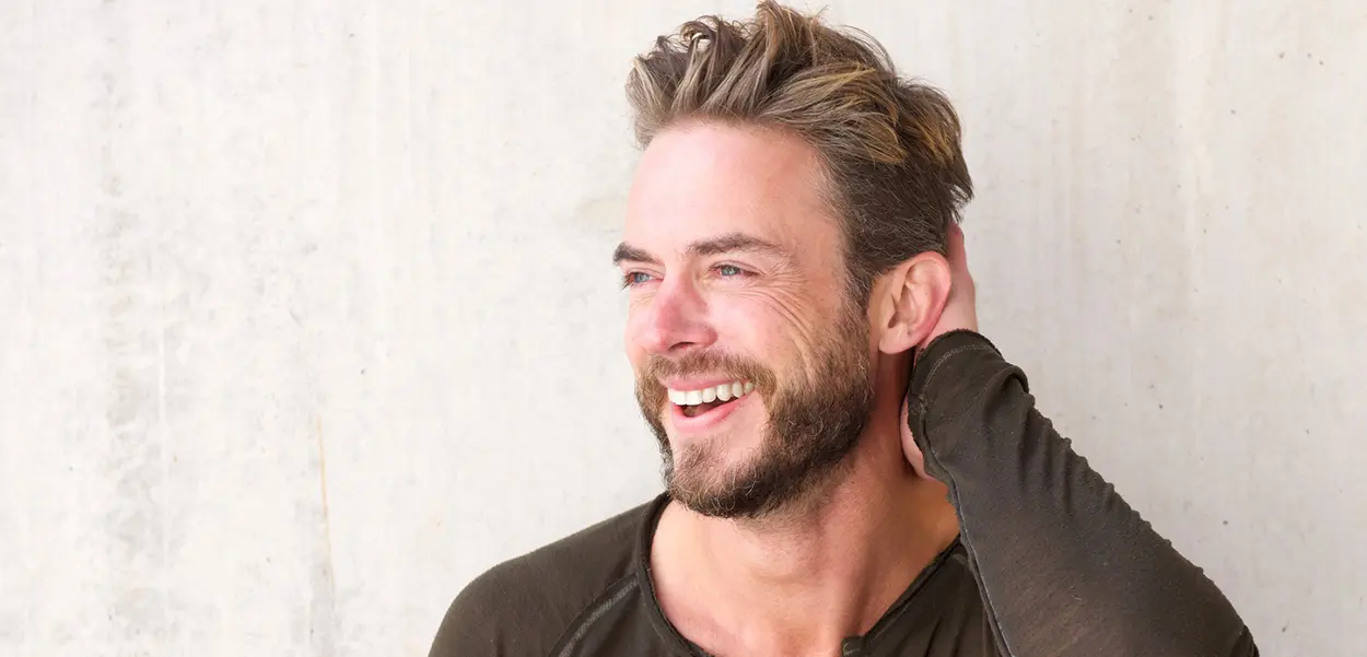 Man Smiling with Dental Crowns