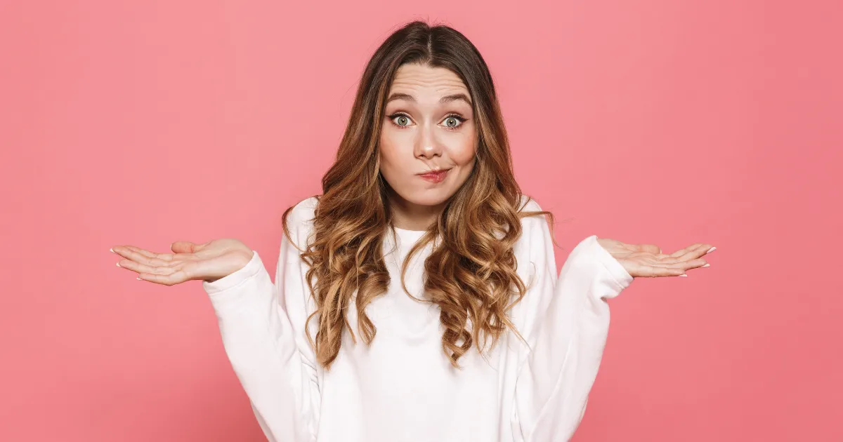 Woman Shrugging Shoulders